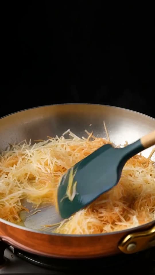 Step 1: Shred & Toast the Kataifi in Ghee: Pull the thawed kataifi strands apart with your fingers so no clumps remain, then cho