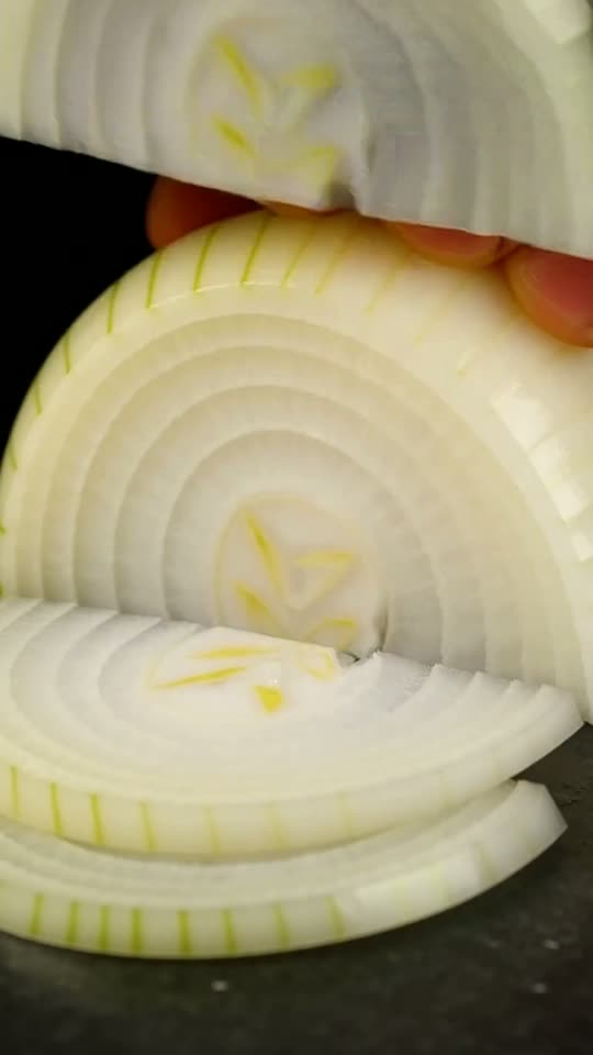 Step 1: Slice the Yellow Onions Uniformly: Peel and halve 1.8 kg (4 lbs) of yellow onions from pole to pole, then slice into uni