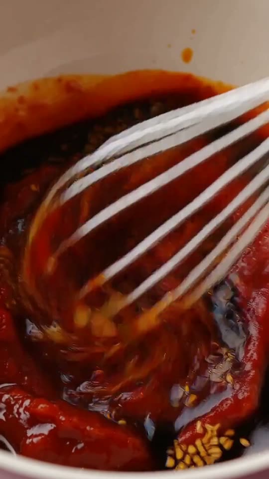 Step 2: Whisk the Gochujang-Honey Glaze: In a bowl, whisk together 3 tbsp Korean gochujang (fermented red chili paste), 2 tbsp h