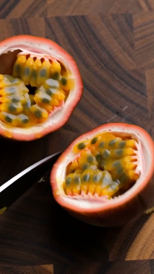 Step 2: Halve the Passion Fruits & Scoop the Seed Pulp: Using a sharp serrated or chef's knife, slice 3 ripe, heavy, wrinkled pu