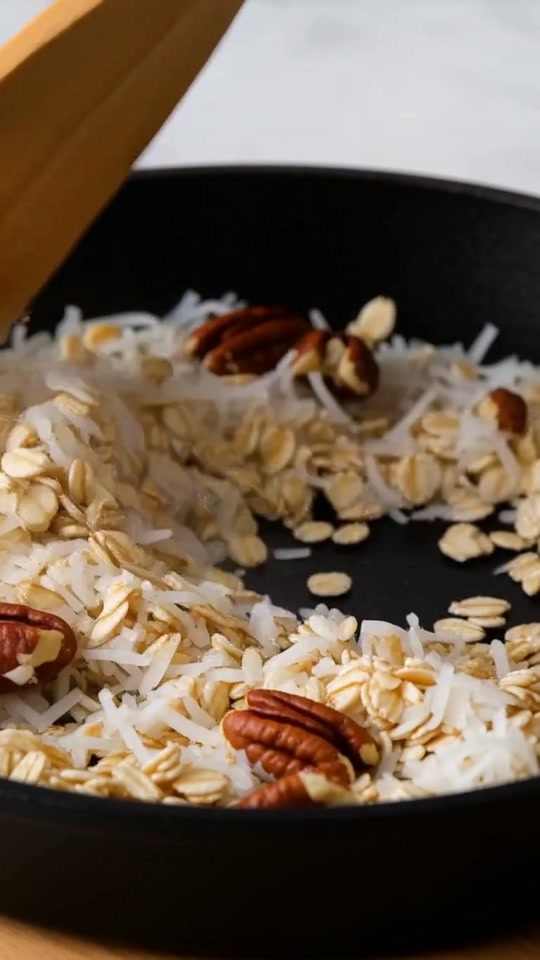 Step 1: Toast the Skillet Canela Oat, Coconut & Pecan Granola: Warm a dry heavy skillet over medium-low heat until the surface r